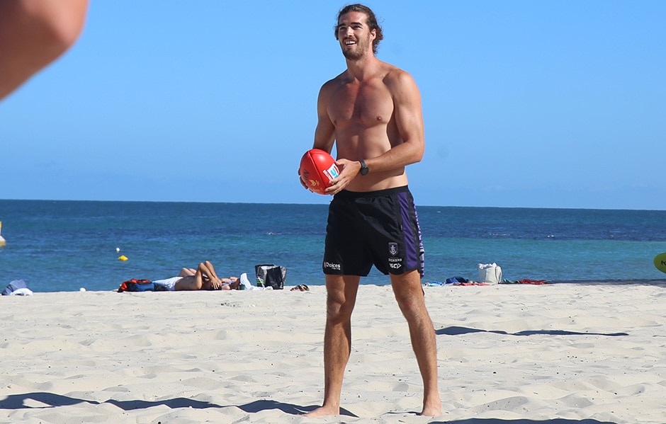 beach web 222.jpg Alex Pearce getting some sun at Cottesloe Beach. - Fremantle,Fremantle Dockers